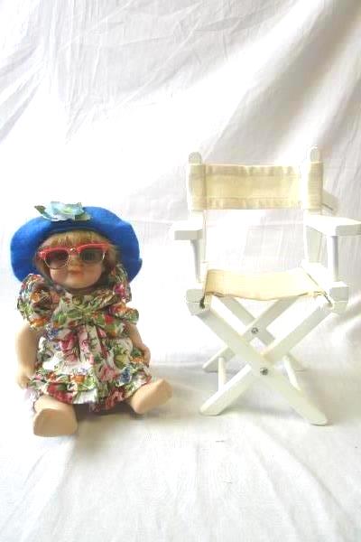 Multi-Colored Beach Themed Porcelain Doll With Glasses Hat And Beach Chair