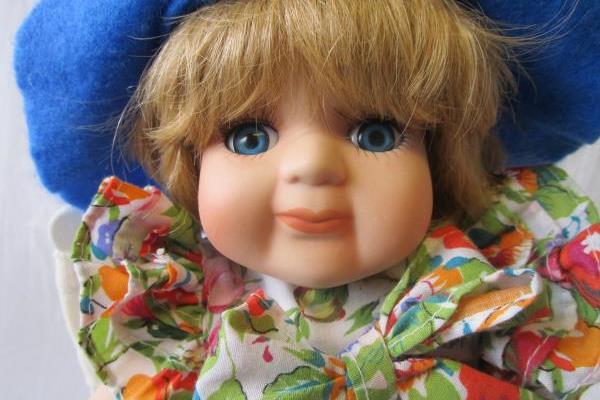 Multi-Colored Beach Themed Porcelain Doll With Glasses Hat And Beach Chair