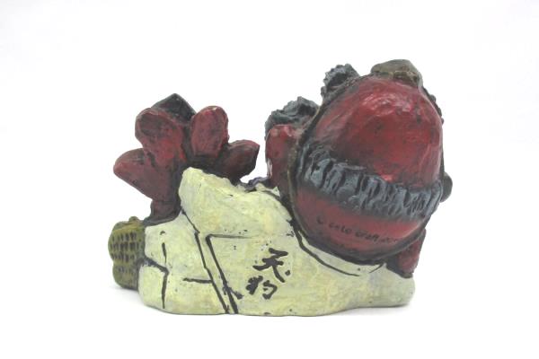 2010 Seto Craft Figurine Folk Art Reclining Man Holding A Red Flower Decorative