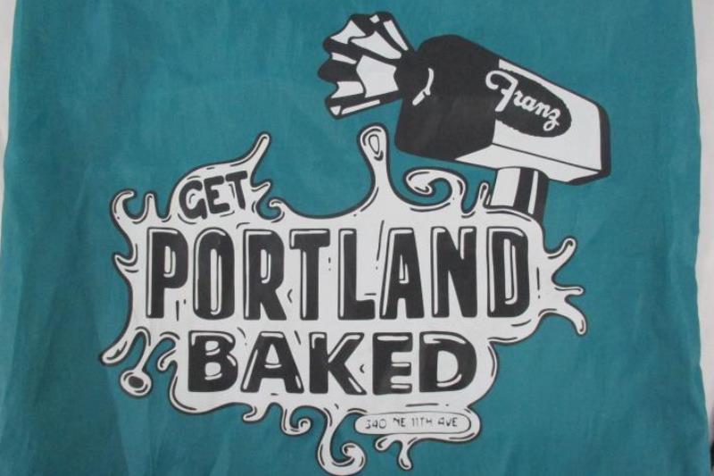 Franz Bakery Graphic Drawstring Backpack Get Portland Baked Teal Black