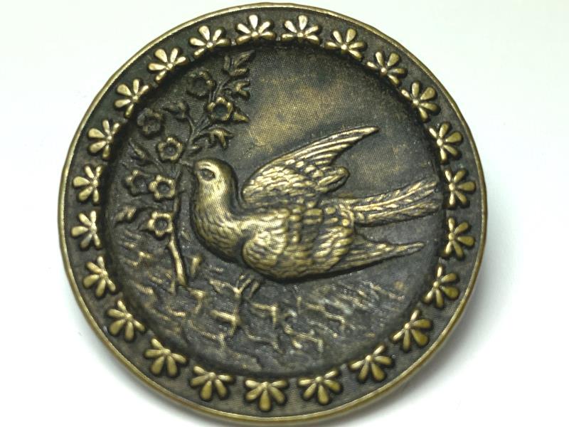 Antique Brass Metal Shank Button Featuring A Dove And Flowers 1 3/8 Inch