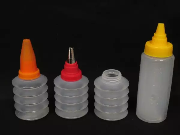 Lot of Baking Accessories Cupcake Pan Liners Cups Frosting Tips Bottle Wilton
