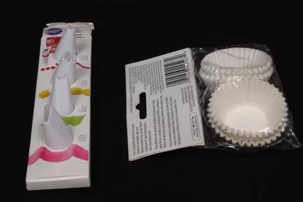 Lot of Baking Accessories Cupcake Pan Liners Cups Frosting Tips Bottle Wilton