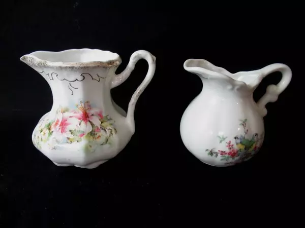 Lot of 2 Hand Painted Porcelain Creamers Floral Patterns Pitchers