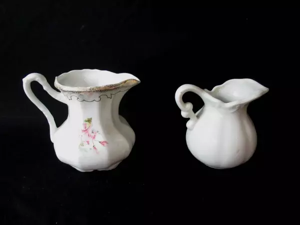 Lot of 2 Hand Painted Porcelain Creamers Floral Patterns Pitchers