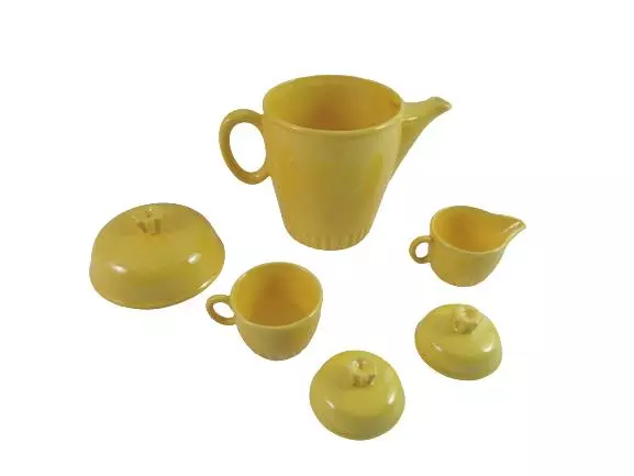 Yellow Ceramic Coffee or Teapot With Matching Creamer And Sugar Bowl