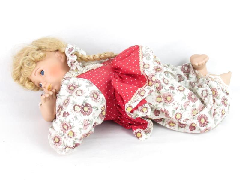 Blonde Haired Porcelain Doll Laying On Her Belly 16.5 Inches Long