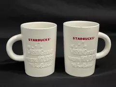 Lot of 2 Starbucks 2010 Holiday Coffee Cups with Embossed Stars