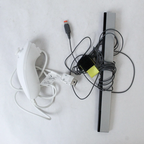 Nintendo Wii Bundle With Wheel Remote Nunchuck and Remote Dock Untested