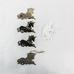 Lot of 5 Unicorn Christmas Ornaments 4 Brass and 1 Starched Linen