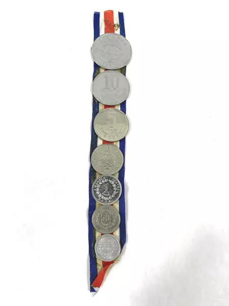 Lot of 7 Coins From Costa Rica On a Red White And Blue Striped Ribbon