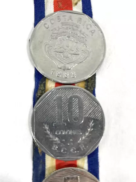 Lot of 7 Coins From Costa Rica On a Red White And Blue Striped Ribbon