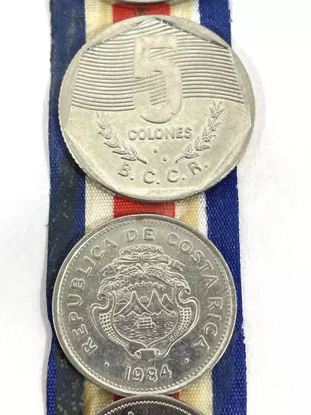 Lot of 7 Coins From Costa Rica On a Red White And Blue Striped Ribbon