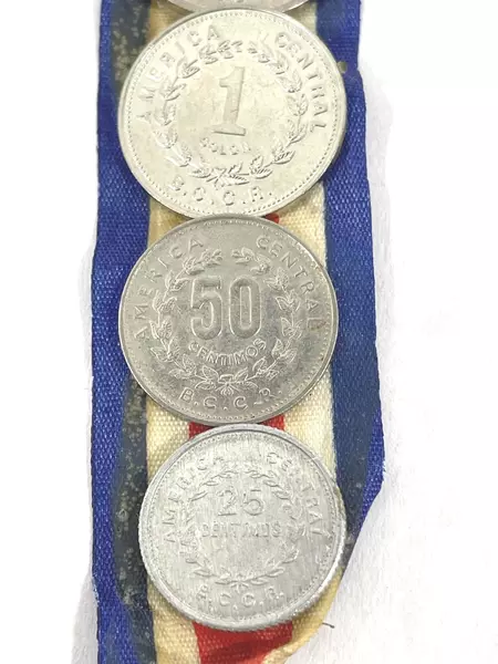 Lot of 7 Coins From Costa Rica On a Red White And Blue Striped Ribbon