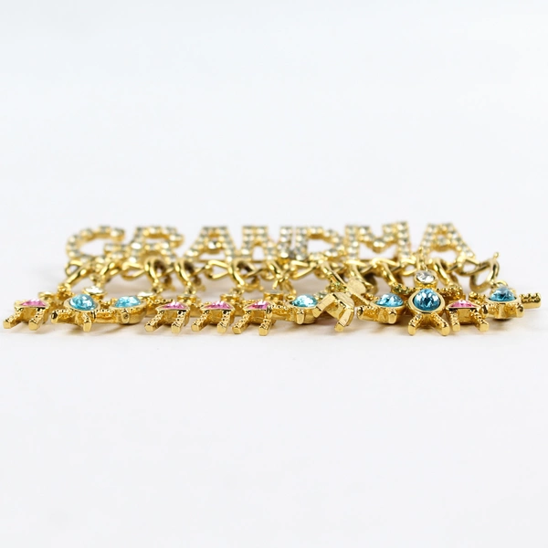 Vtg Cookie Lee Rhinestone And Gold Tone Grandma Brooch Pin W/ Grandchild Charms