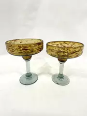 Set of 2 Hand Blown Amber Margarita Glasses Green Stem Chip on One
