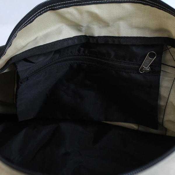 Eastpak Beige Medium Duffle Bag With Black Straps