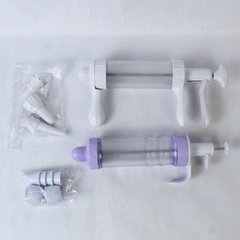 Lot of 2 Cookie Presses and Nozzles Plastic Frosting Cupcake Cake Decorating