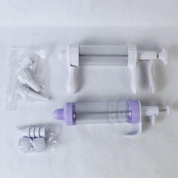 Lot of 2 Cookie Presses and Nozzles Plastic Frosting Cupcake Cake Decorating