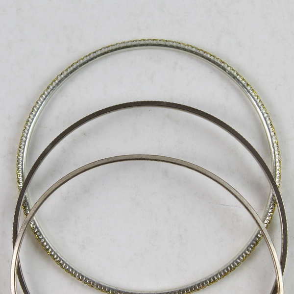 Three Piece Bangle Bracelet Set Sterling Silver And Gold Glitter