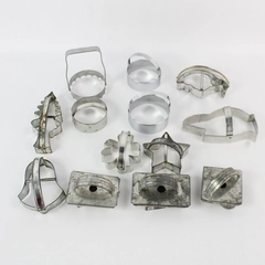 Lot of 13 Vintage Handled Metal Cookie Cutters With Various Shapes And Designs