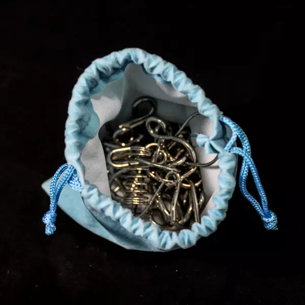 33 Piece Metal Brain Teaser Puzzle With Blue Velvet Bag