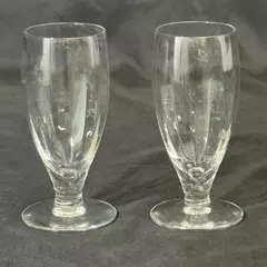 Set Of 2 Clear Tapered And Footed Glasses With A Paneled Pattern 5 inch