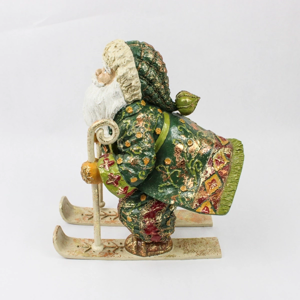 Green Red and Gold Skiing Old World Santa Resin Figure 10"
