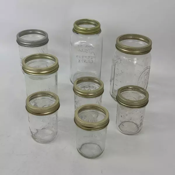 Lot of 8 Assorted Sized Canning Jars With Rings Ball and Kerr 1/2 Pint to Quart