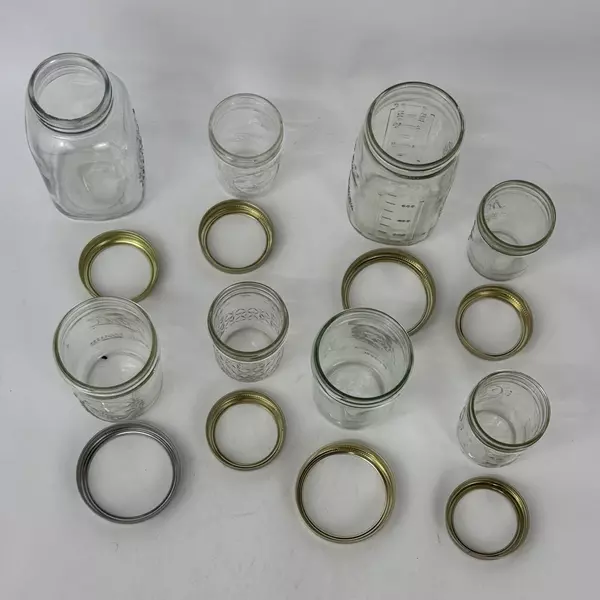 Lot of 8 Assorted Sized Canning Jars With Rings Ball and Kerr 1/2 Pint to Quart