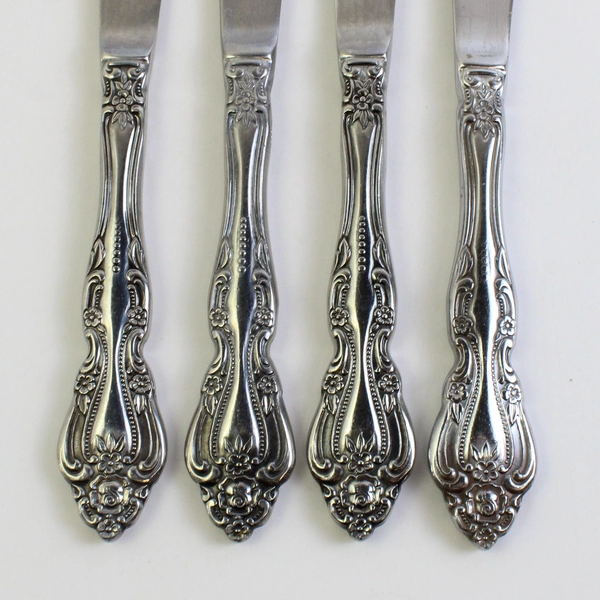 Set of 4 International Chalmette Stainless Steel Solid Handle Steak Knives