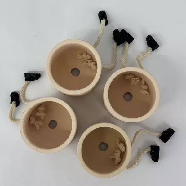 Set of 4 Smiling Ceramic Shelf Planters with Legs And Feet Beige