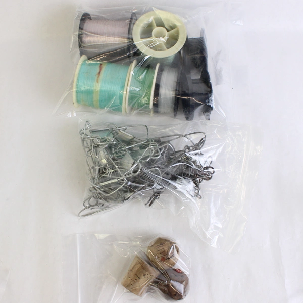Mixed Lot of Fishing Tackle Hooks Lines Weights and More