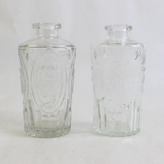 Set Of 2 Matching Unbranded Embossed Decorative Clear Glass Bottle/Vases 5" Tall