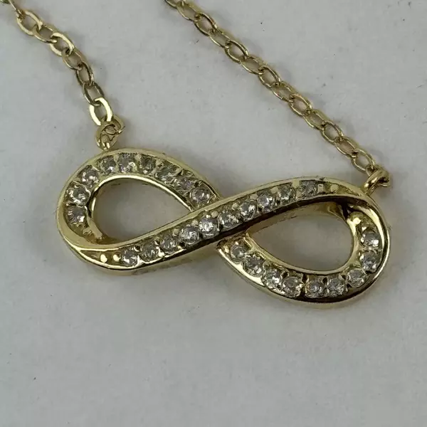 Himalaya Jewelry Sterling And Cubic Zirconia Figure 8 Necklace And Earring Set