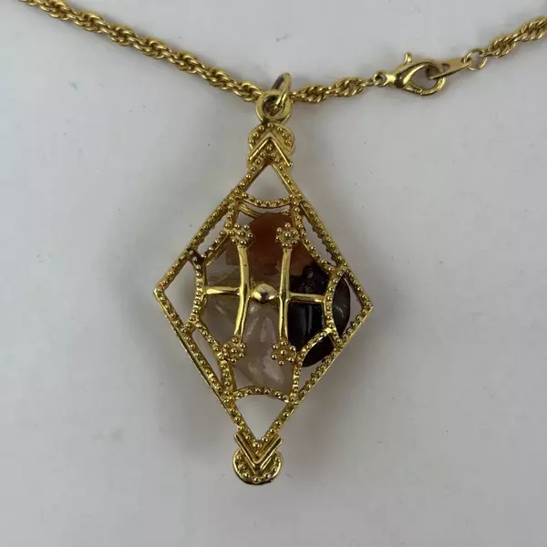 Gold Tone Diamond Shaped Cage Pendant Necklace With Healing Stones