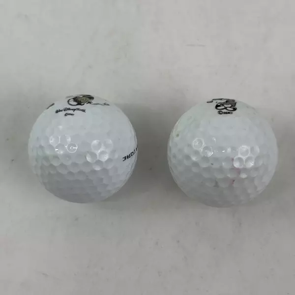 2 Golf Balls Walt Disney Mickey Mouse Swinging A Golf Club Logo Pinnacle 3