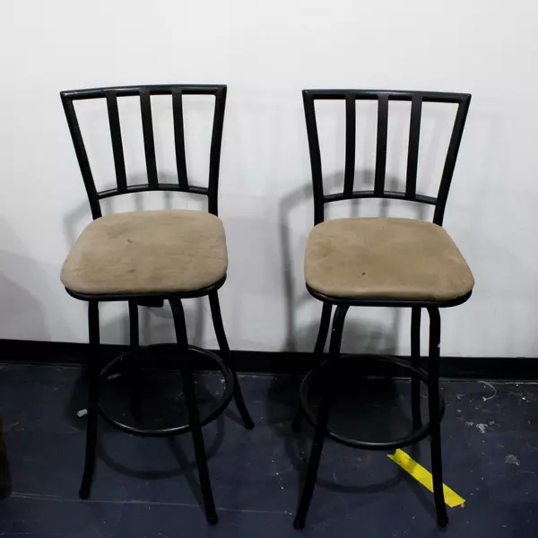 Set of 2 Tall Black Swivel Bar Stool Chairs with Tan Upholstery and Backrest