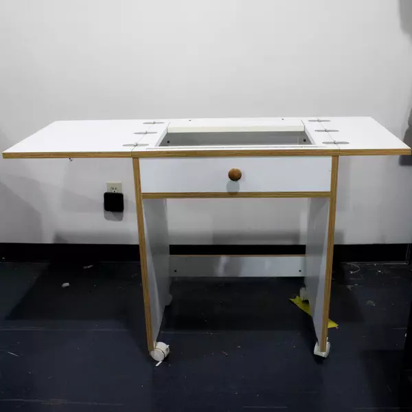 Rolling White Sewing Table with Fold-Out Leaves and Built-in Measuring Guide