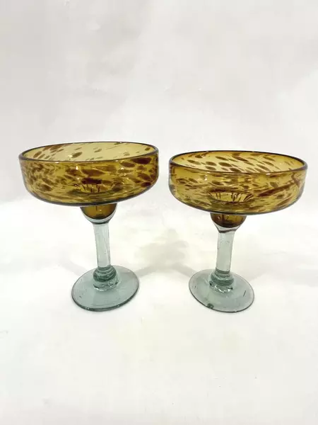 Set of 2 Hand Blown Amber Margarita Glasses with Green Stem Chip on One