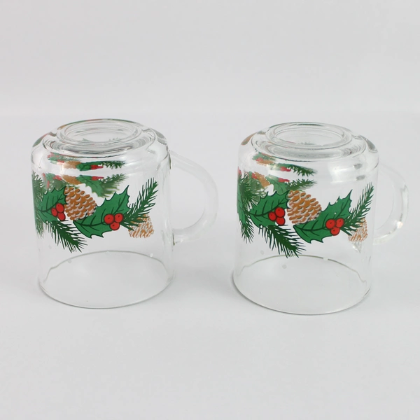 Lot of 2 Holiday Clear Glass Mugs with Holly Berry Pine Cone Pattern 3.5"