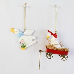Lot of 2 White Duck Ornaments 1 Schmid And 1 Unbranded Sitting In Red Wagon