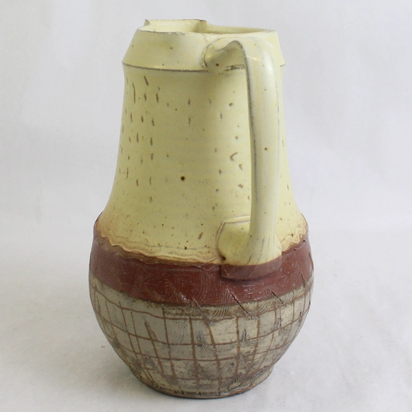 Ceramic Textured Design Yellow Red Pitcher by Bridget Hauser