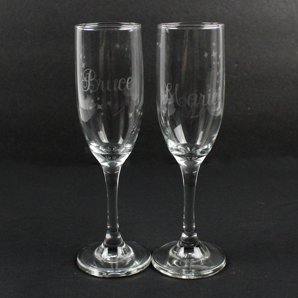 Pair of Crystal Champagne Glasses Etched Bruce Marie With Stars