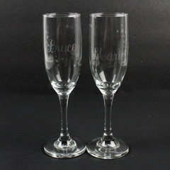 Pair of Crystal Champagne Glasses Etched Bruce Marie With Stars