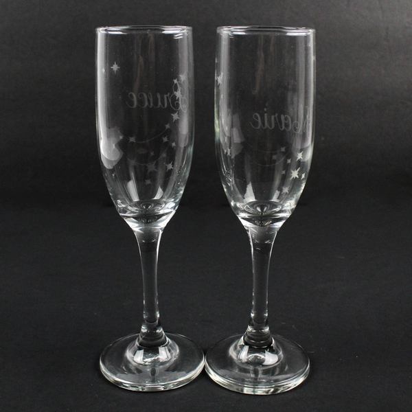Pair of Crystal Champagne Glasses Etched Bruce Marie With Stars