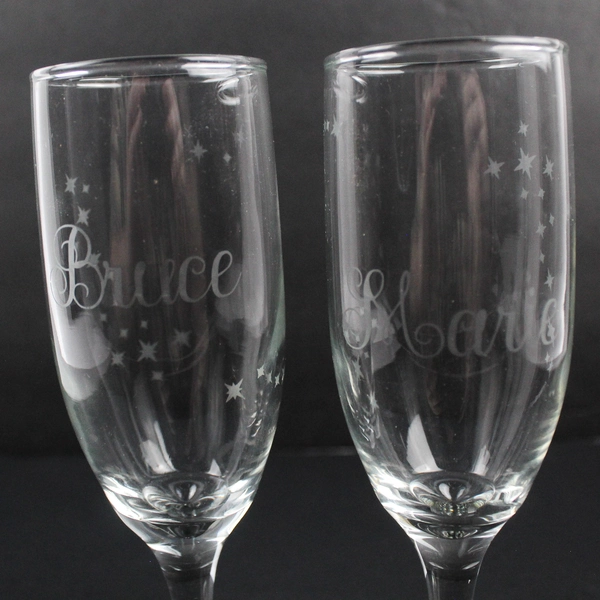 Pair of Crystal Champagne Glasses Etched Bruce Marie With Stars