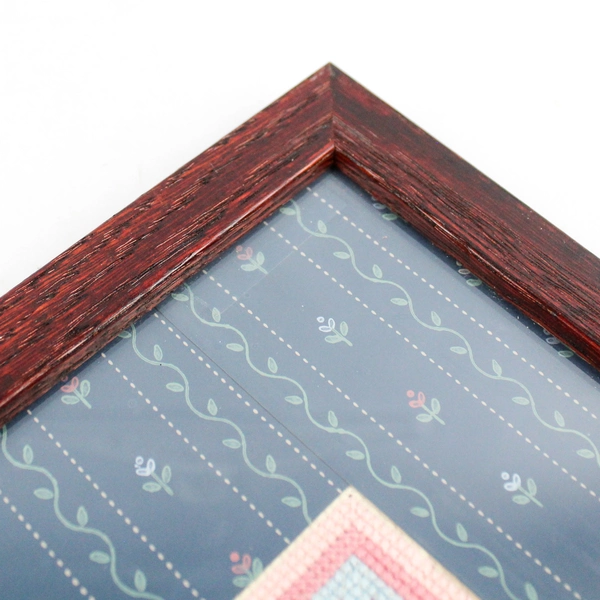 Framed and Matted Pink Blue and White Cross Stitch Square Wall Art