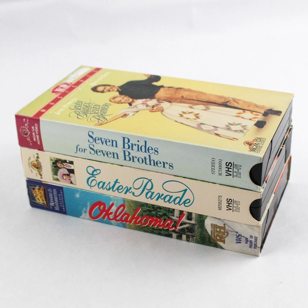 Set of 3 Musical Film VHS Tapes, Oklahoma 55 Easter Parade 48 Seven Brides 54