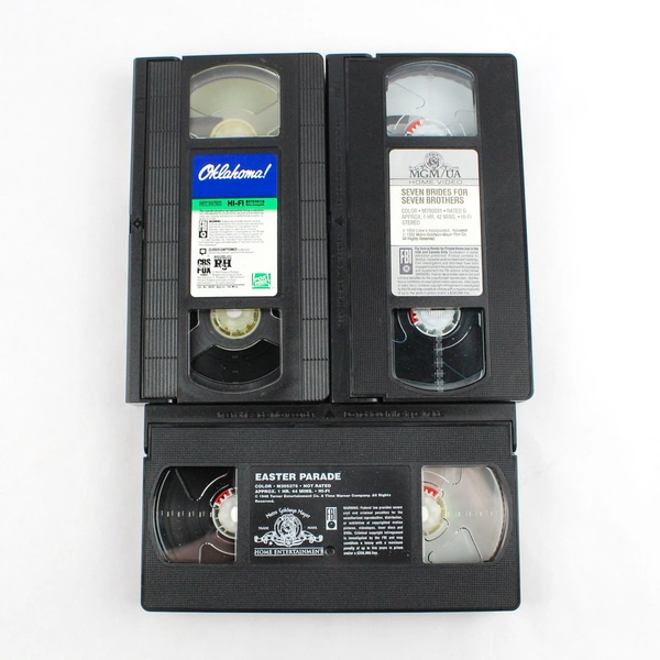 Set of 3 Musical Film VHS Tapes, Oklahoma 55 Easter Parade 48 Seven Brides 54